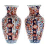 Pair of Japanese Imari vases, of lobed baluster form decorated in a typical palette, 9" high (2)