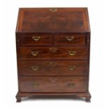 Small 19th century mahogany bureau, the crossbanded fall front enclosing a fitted interior of