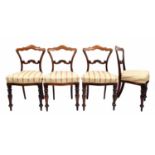 Set of four Victorian mahogany dining chairs, the shaped balloon style backs over pink floral