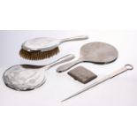 William Aitken silver dressing brush and mirror; together with another engine turned silver dressing