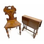 Victorian mahogany shield back hall chair, with a serpentine seat upon front turned supports, 17"