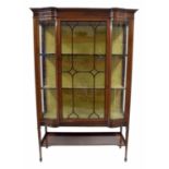 Edwardian mahogany inlaid display cabinet, with a central astragal glazed door flanked by bowed
