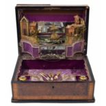 Unusual 19th century walnut musical automaton dressing box, the hinged cover revealing a river autom