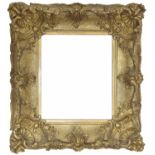 18th century gilt picture frame, with pierced raised scroll details and shell corners, bearing