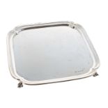 Viner's Ltd. square silver card tray, with moulded rim, raised on four leaf scroll feet, 9" x 9",