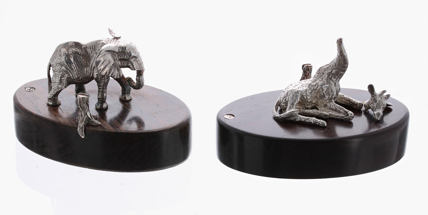 Two Patrick Mavros silver menu holders, modelled as an Elephant and a Giraffe (neck damage at