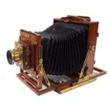 Late 19th/early 20th century 'The Victo' mahogany cased field camera, by Houghtons Ltd. London