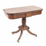 Regency plum mahogany foldover tea table, the rectangular revolving top upon a good quality reeded