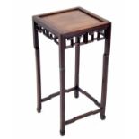 Chinese square hardwood jardiniere stand with a pierced fret frieze, 12.25", 25" high