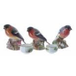 Three Royal Worcester porcelain Bullfinch figures, model no. 3238, 2.75" high; together with a