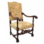 Carolean style upholstered throne armchair, the padded back and stuffover seat with modern