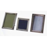 Two silver rectangular strut photograph frames, both Birmingham early 20th century, largest 6.5" x