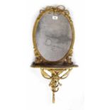 Decorative giltwood gesso oval wall mirror, with rope twist tassel moulded frame and glass of