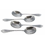 Four Russian silver serving spoons, with twist handles and foliate engraved decoration, marked 84