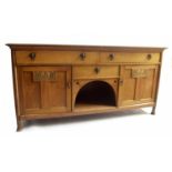 Interesting Arts & Crafts large oak sideboard, the moulded top over two long drawers and a short