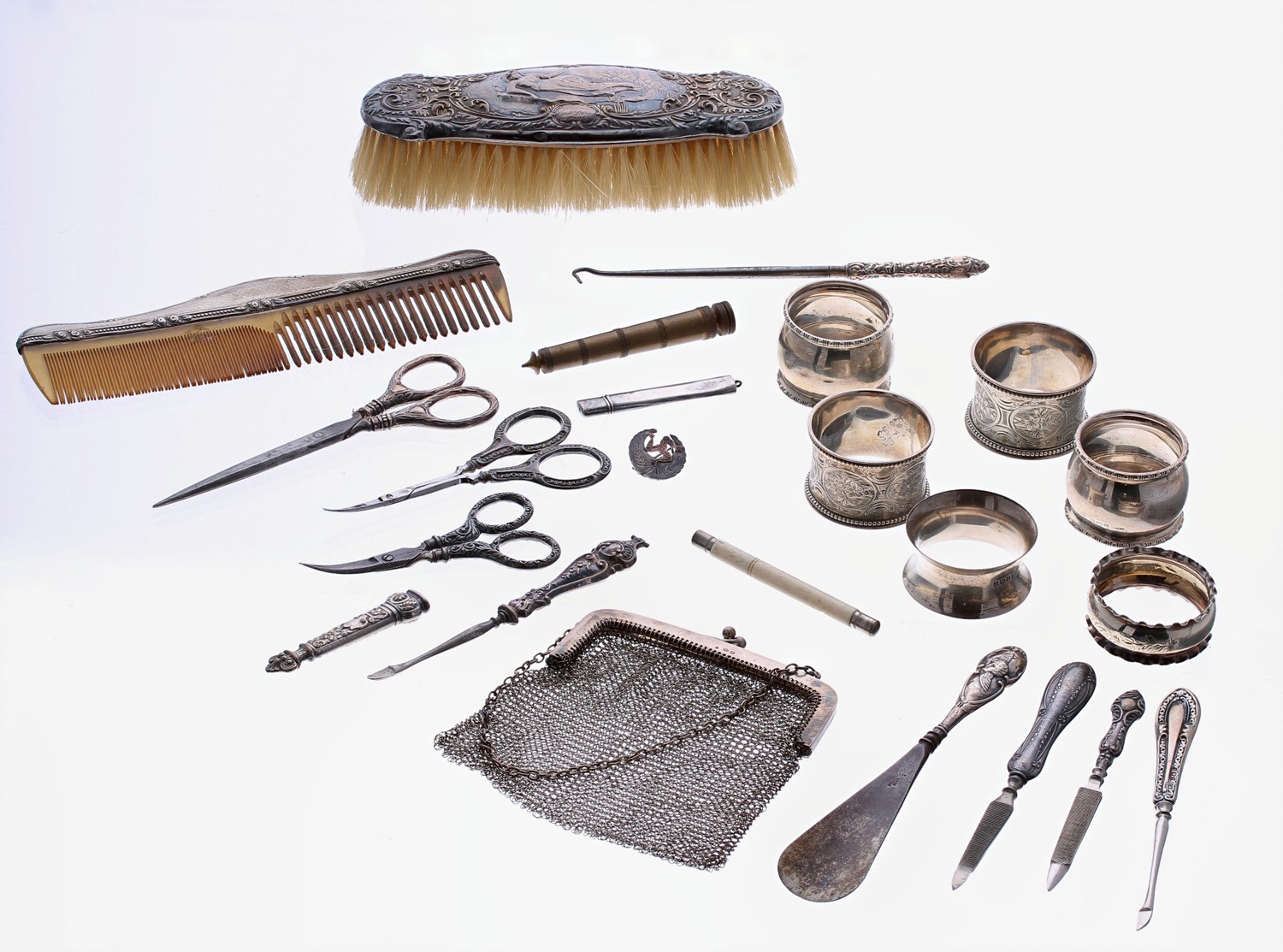 Selected silver pieces primarily dressing items including a brush, comb, vanity scissors, files etc;
