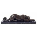 After Lous-Albert Carvin (French 1875-1951) - bronze figure of a recumbent hound, mounted upon a