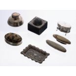 Selected silver items including a Capstan inkwell, shaped bijouterie box, repousse cover box with