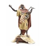 After Arthur Waagen (German 1833-1898) - painted spelter figure of an African gentleman performing