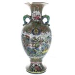 Chinese twin-handled porcelain baluster vase, polychrome enamelled with figures in traditional