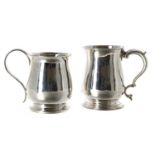 George III silver tankard, with C scroll leaf capped handle raised on a shallow foot rim,