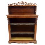 Victorian mahogany dwarf open bookshelf, the carved fretwork gallery back over two adjustable open