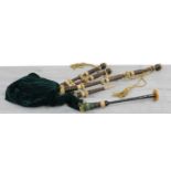 Contemporary set of Scottish wooden turned bagpipes within a wooden box, the box 24" x 9"