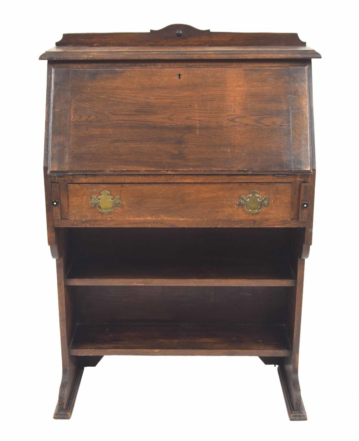 Early 20th century oak escritoire, the raised moulded back over a fall front supported upon lopers