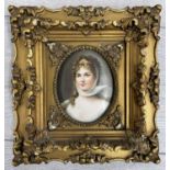 Continental School (20th century) - portrait of an elegantly dressed young lady, a painted plaque,