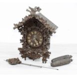 Black Forest carved cuckoo clock (pendulum and two weights) 16" high