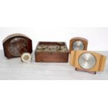 Three vintage mantel clocks, two by Smiths and one Metamec; together with a 'Baby Ben' travel