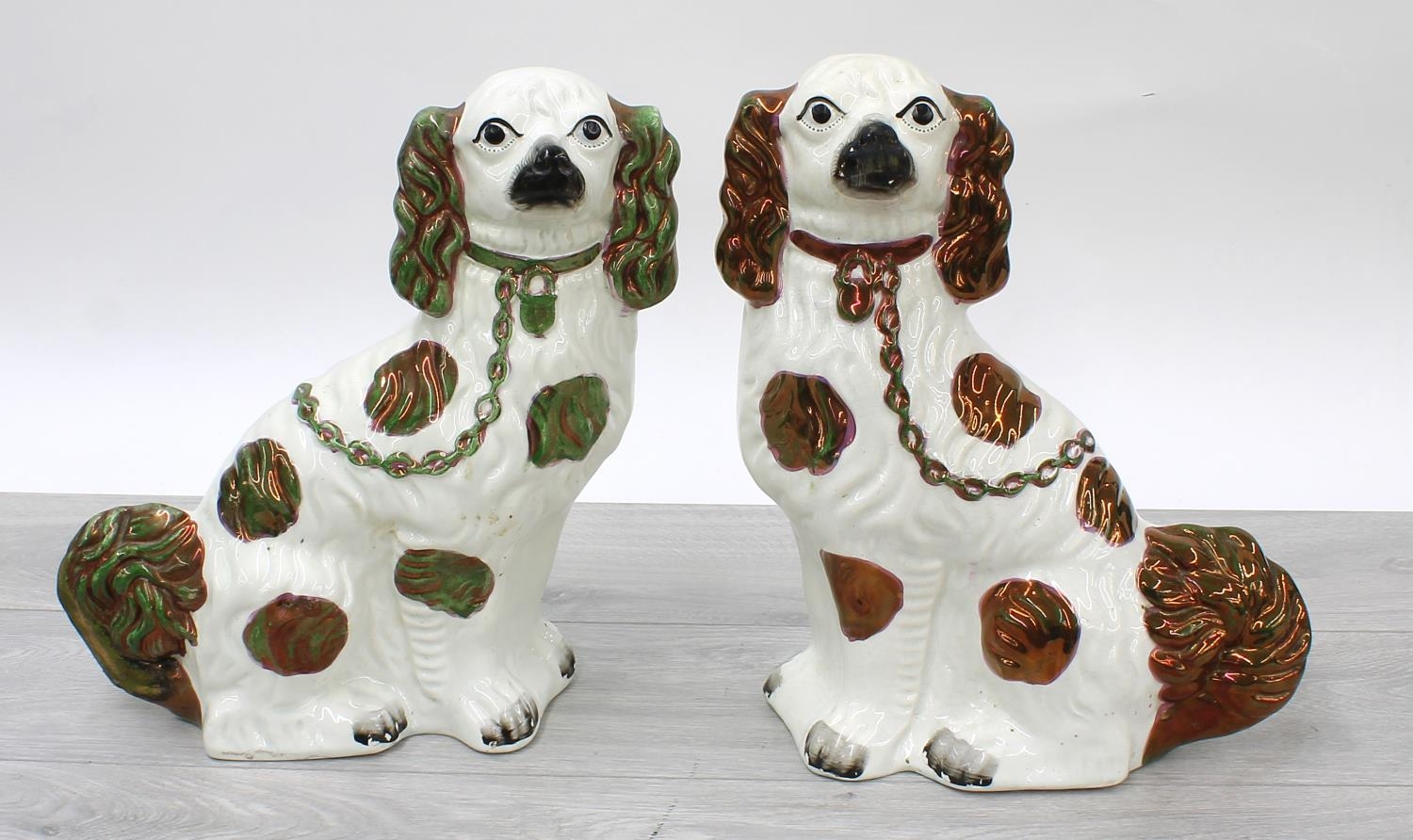 Pair of  Victorian Staffordshire dogs, each with copper lustre highlights, 12.5" high approx