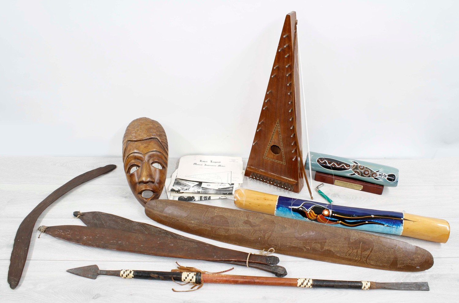 Small selection of African and ethnic musical instruments, African spear, tribal shield, mask and