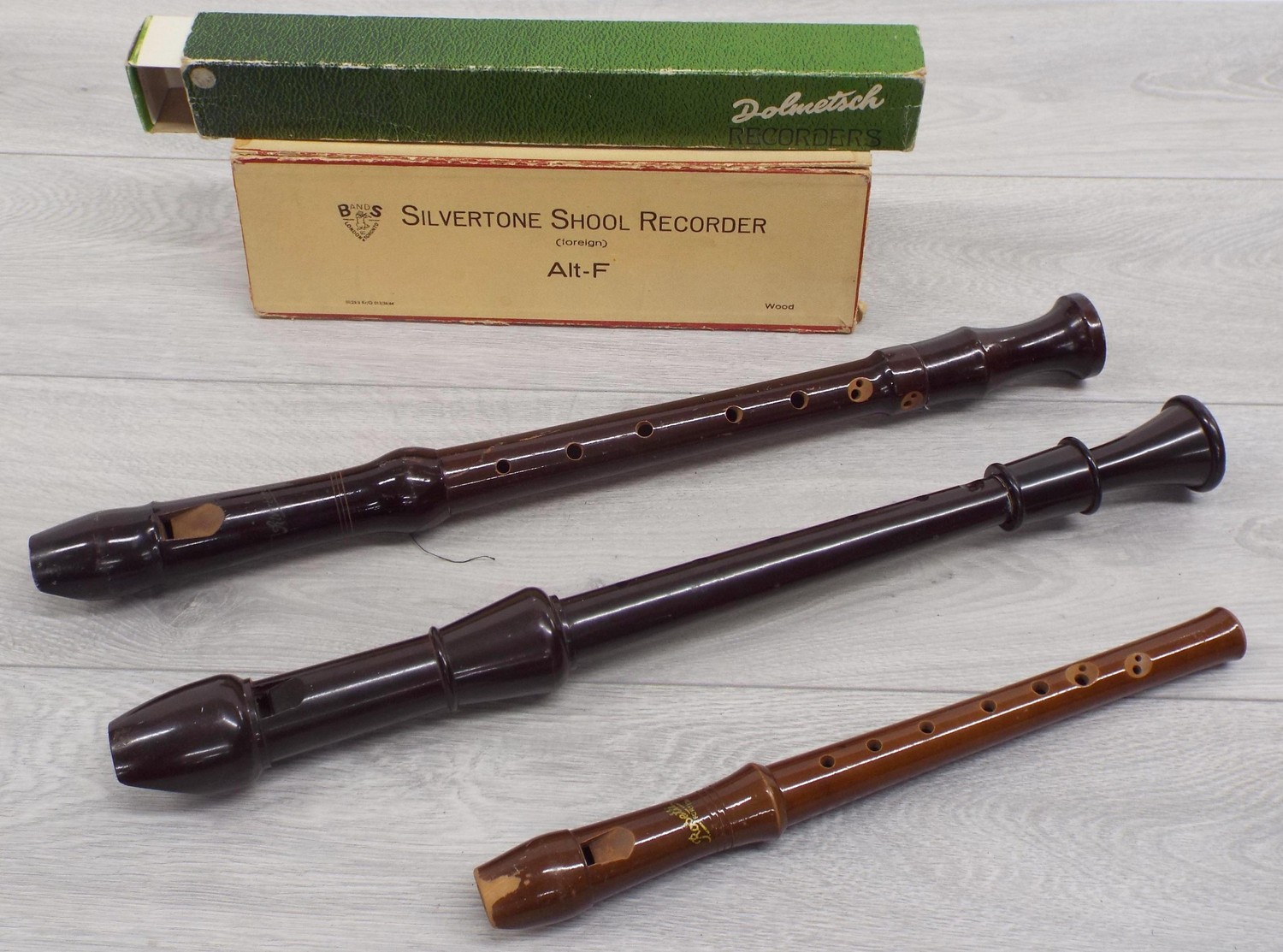 Two vintage boxed wooden recorders, Silvertone School Recorder three piece and Rosetti two piece (