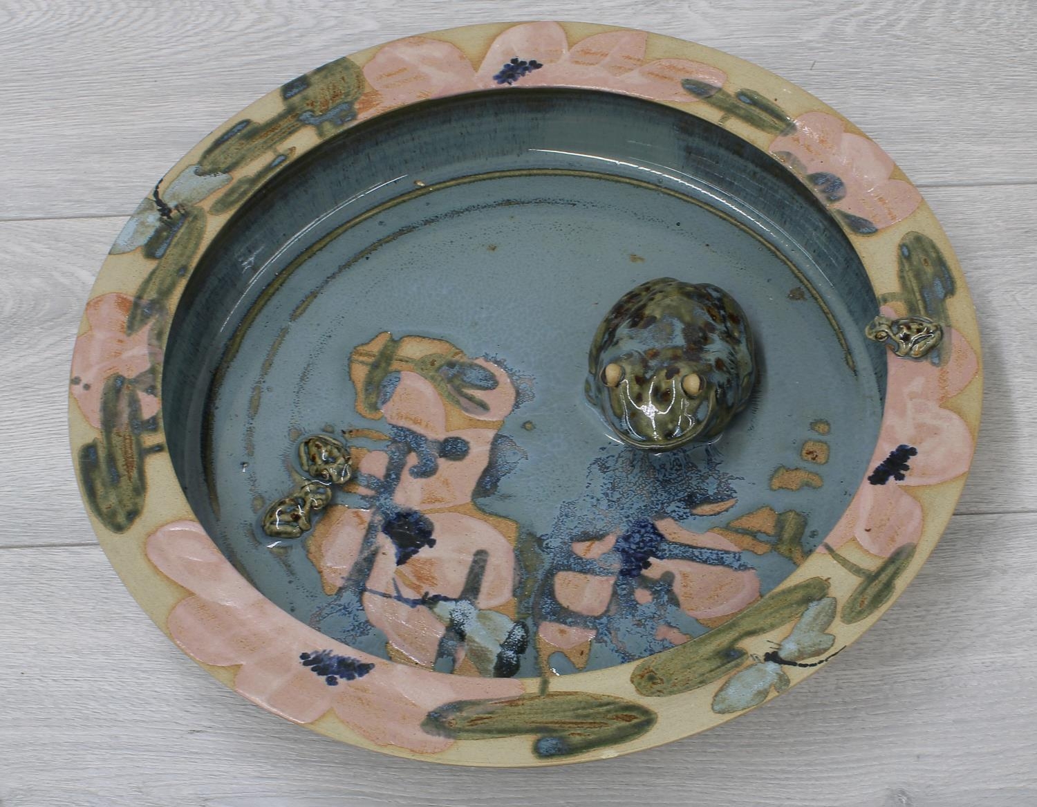 Alan and Lyn Newton studio glazed circular shallow bowl decorated with frogs, stamped Newton to