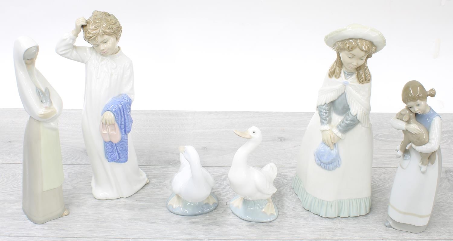 Collection of Spanish porcelain figures including Lladro, NAO and Rosal, the taller figures 11" high