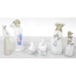 Collection of Spanish porcelain figures including Lladro, NAO and Rosal, the taller figures 11" high