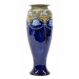 Royal Doulton stoneware tall slender glazed vase, decorated with foliate garlands in low relief upon