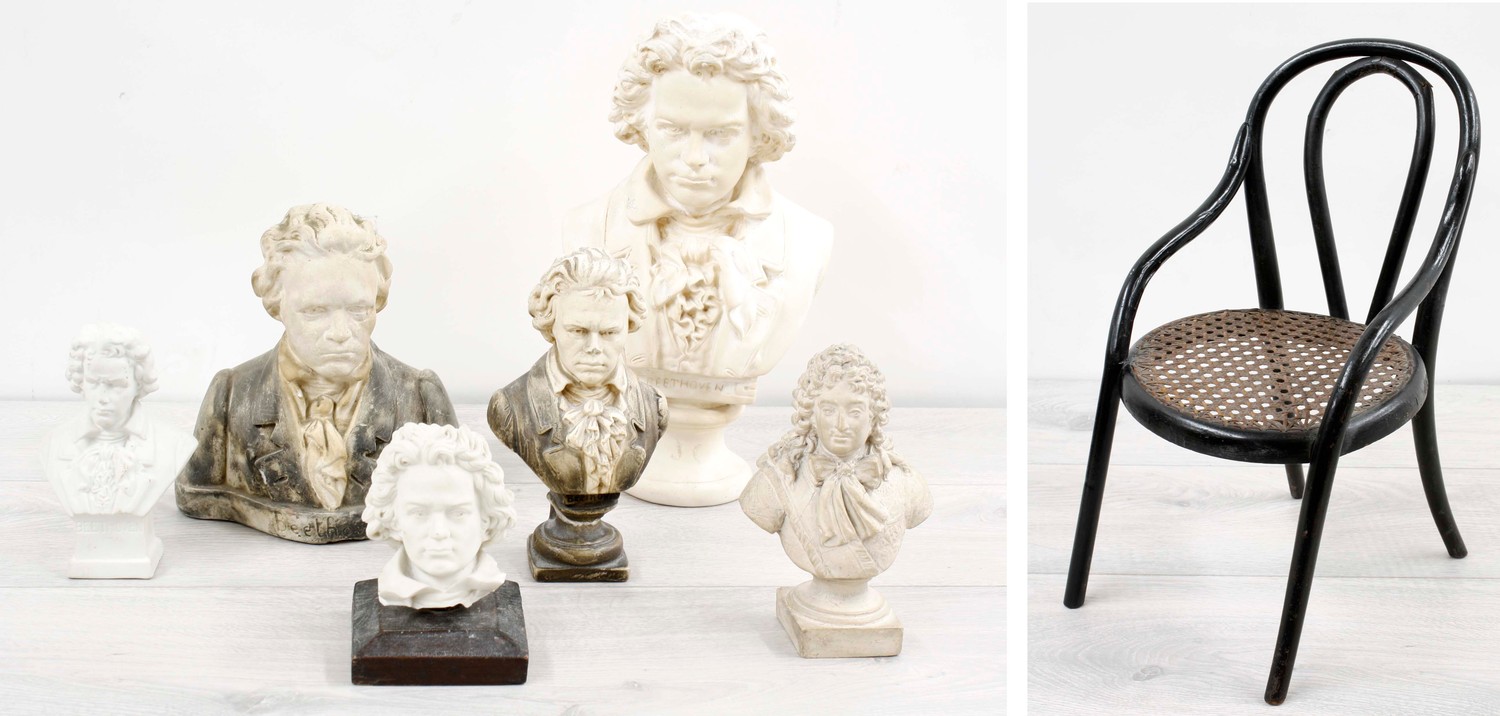 Six plaster busts of Beethoven, tallest 11.5" high; together with a small scale apprentice