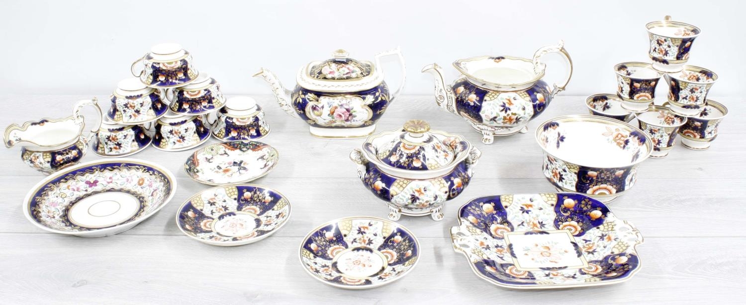 Attractive early 19th century English porcelain tea service painted with flowers within blue and - Image 2 of 5