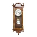 Contemporary 31 day two-train Vienna type  wall clock, the dial signed Highlands, 38" high (pendulum