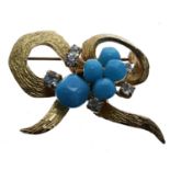 Christian Dior stone set bow design brooch, marked '19 Chr Dior 66 Germany', 48mm wide approx