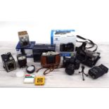 Collection of cameras and accessories; including Konica Minolta Dimage A2, Panasonic FX100 Lumix