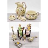 Potter jug and wash basin set with soap dishes and chamber pot; Pair of Continental pottery figures,