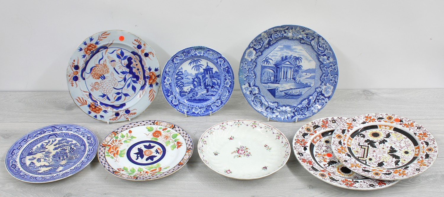 Collection of pottery and porcelain plates including a blue and white 'Palladian Porch' pattern