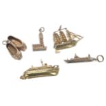 Five 9ct charms including three ships, shoes and Big Ben, 26.7gm, the largest ship 37mm (5)  (