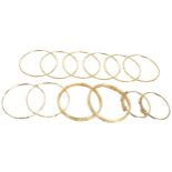 Twelve assorted yellow gold bangles, 194.4gm (140186-1-A)