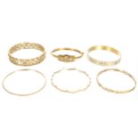 Eleven assorted high grade yellow metal bangles, 244gm (140186-2-A)