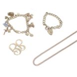 9ct charm bracelet, 9ct curb bracelet, 9ct necklet and a 9ct 'JG' brooch, 74.6gm in total (7214-1-A)