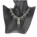 Fine and attractive white gold emerald and diamond necklace with a pair of drop earrings, the